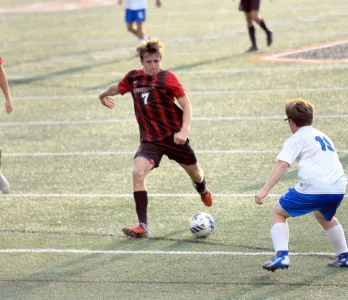 Big Red rolls in home opener